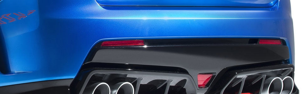 High-performance carbon fiber spoiler, front splitter, and side skirts designed to improve aerodynamics and styling for track and street cars.