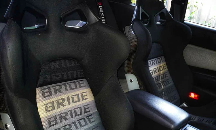 Torque Lab racing seats with seat rails and side mounts for performance driving